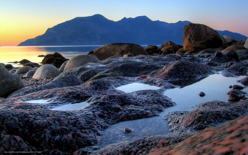 Rocky Shoreline at Sunset — Blue, Serene, Photograph, Mountains, Sea