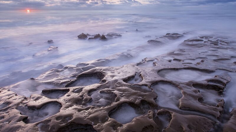 Rocky Shoreline at Sunset — Blue, Serene, Photograph, Ocean, Rocks, Sky