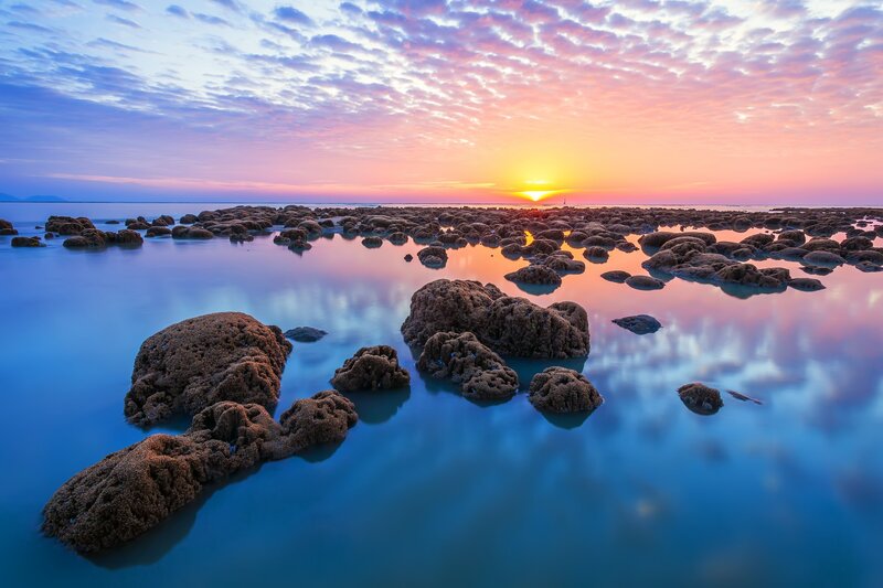 Rocky Shoreline at Sunset — Blue, Serene, Photograph, Rocks, Sky