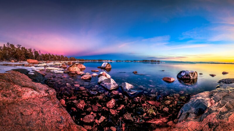Rocky Shoreline at Sunset — Blue, Serene, Photograph, Rocks, Trees, Sky