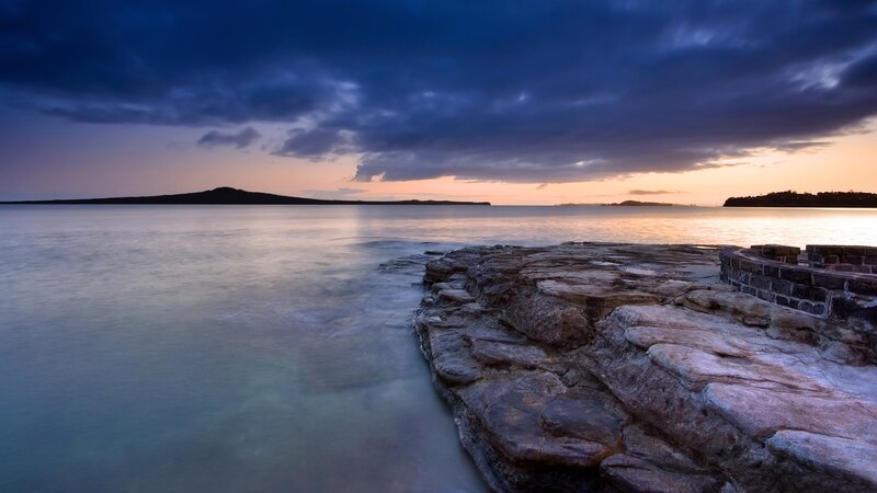 Rocky Shoreline at Sunset — Blue, Serene, Photograph, Sea