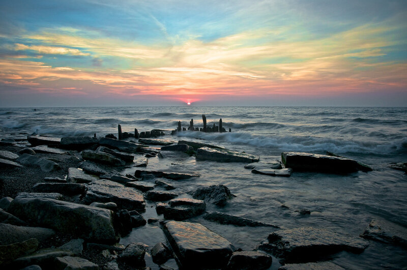 Rocky Shoreline at Sunset — Blue