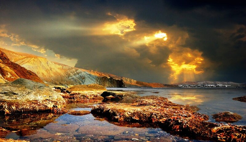 Rocky Shoreline at Sunset — Gold, Dramatic