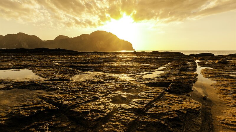 Rocky Shoreline at Sunset — Gold, Serene