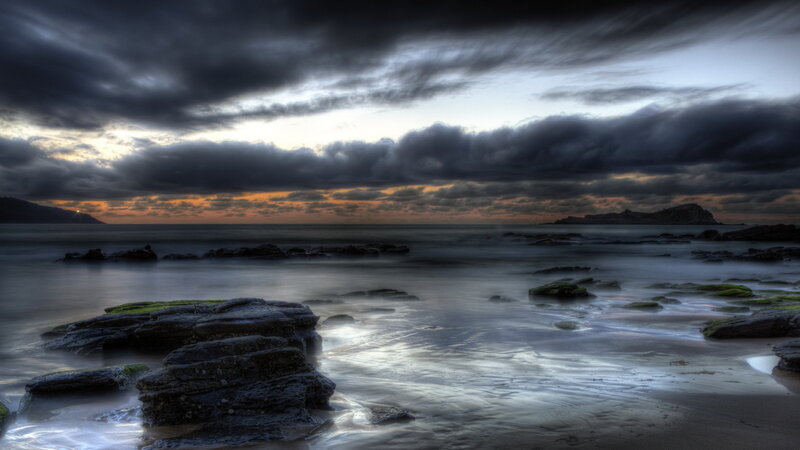 Rocky Shoreline at Sunset — Gray, Dramatic, Photograph