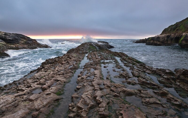 Rocky Shoreline at Sunset — Gray