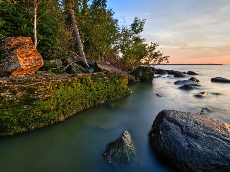 Rocky Shoreline at Sunset — Green, Serene