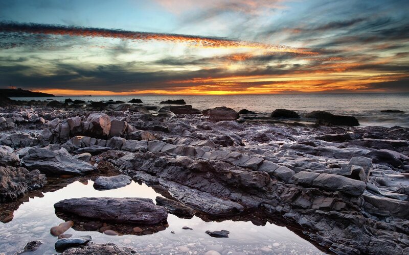 Rocky Shoreline at Sunset — Orange, Dramatic, Photograph, Ocean, Sky, Rocks