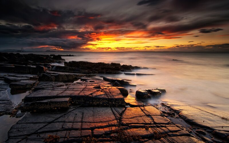 Rocky Shoreline at Sunset — Orange, Dramatic, Photograph, Rocks, Ocean, Sky, Clouds, Yellow, Black