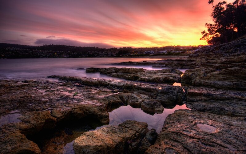 Rocky Shoreline at Sunset — Orange, Dramatic, Photograph, Rocks