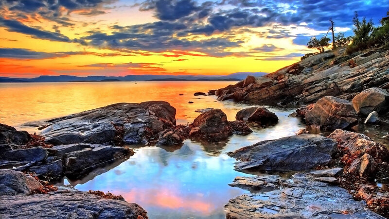 Rocky Shoreline at Sunset — Orange, Dramatic, Photograph, Sea