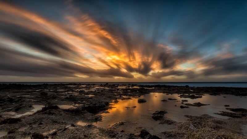 Rocky Shoreline at Sunset — Orange, Dramatic, Photograph, Sky, Clouds