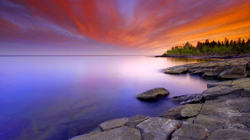 Rocky Shoreline at Sunset — Orange, Dramatic, Photograph, Sky, Trees