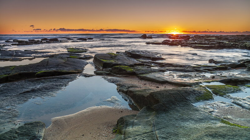 Rocky Shoreline at Sunset — Orange, Serene, Photograph, Ocean, Sun