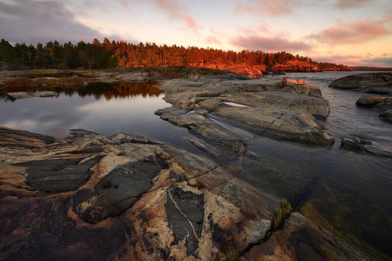Rocky Shoreline at Sunset — Orange, Serene, Photograph, Trees, Water, Sky