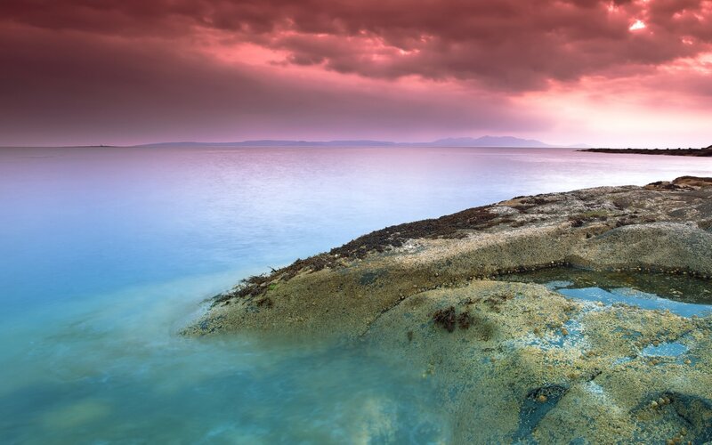 Rocky Shoreline at Sunset — Pink, Dramatic, Photograph, Sea