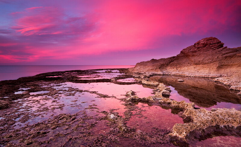 Rocky Shoreline at Sunset — Pink, Dramatic