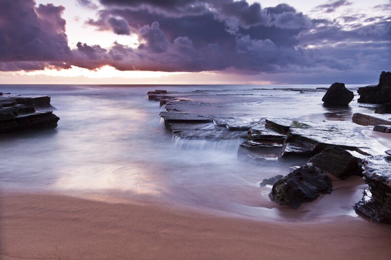Rocky Shoreline at Sunset — Purple, Dramatic, Photograph, Rocks, Ocean, Sky, Sand