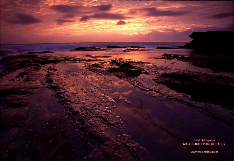 Rocky Shoreline at Sunset — Purple, Dramatic