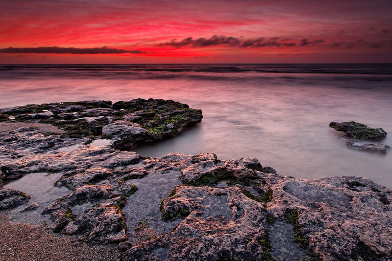 Rocky Shoreline at Sunset — Red, Dramatic, Photograph, Rocks, Ocean
