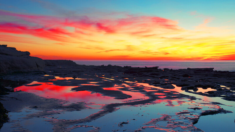 Rocky Shoreline at Sunset — Red, Dramatic, Photograph, Sky, Ocean
