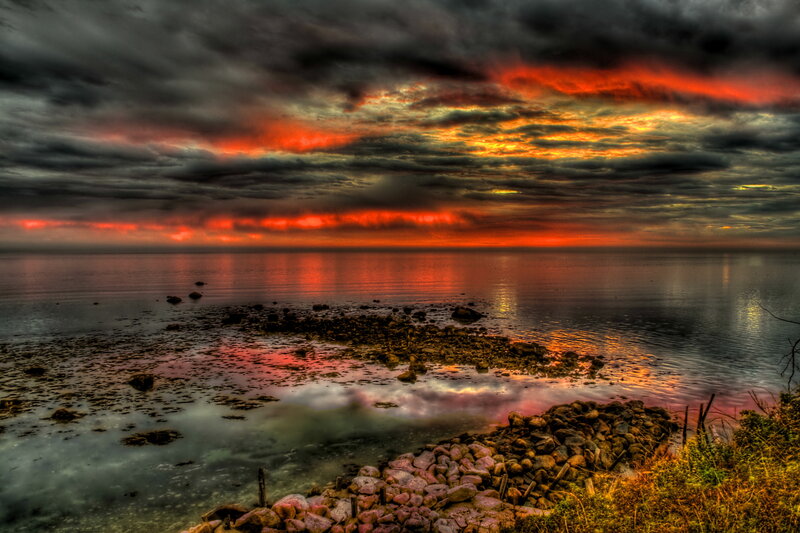 Rocky Shoreline at Sunset — Red, Dramatic, Photograph, Sky, Water