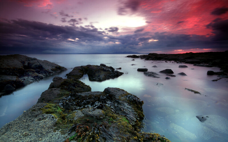 Rocky Shoreline at Sunset — Red, Dramatic