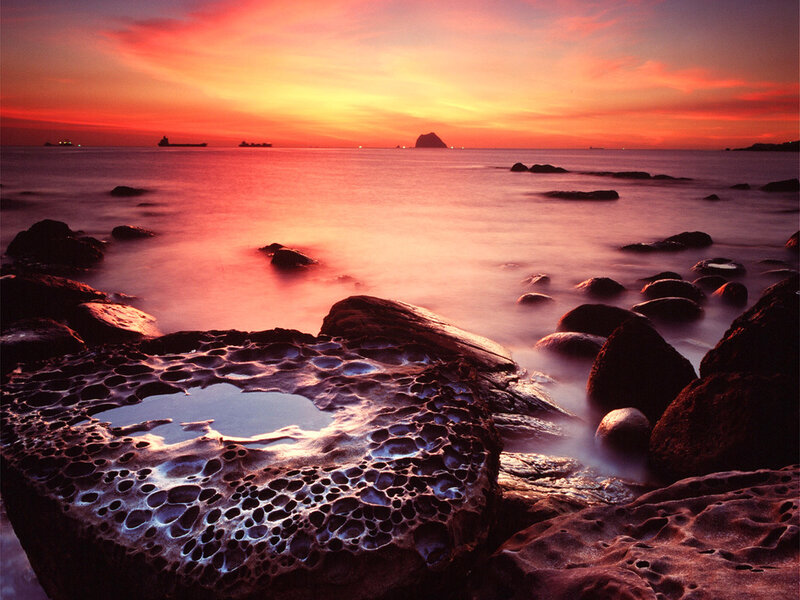 Rocky Shoreline at Sunset — Red