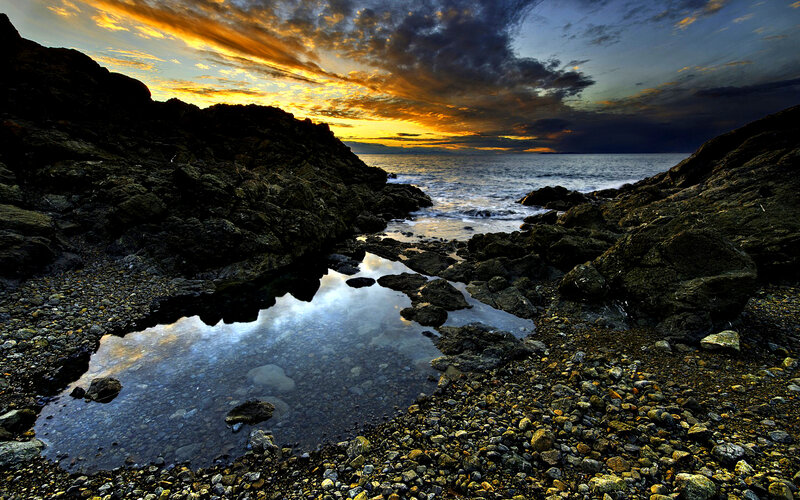 Rocky Shoreline at Sunset — Yellow, Dramatic, Photograph