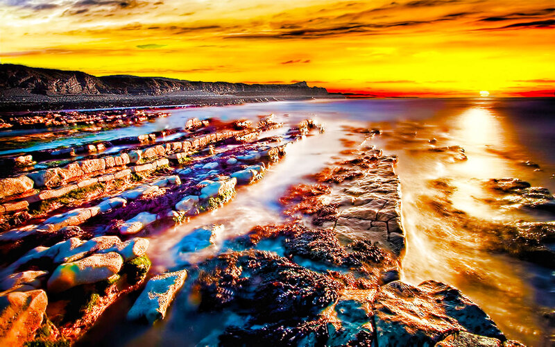 Rocky Shoreline at Sunset — Yellow, Dramatic