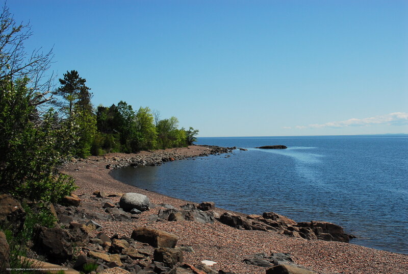 Rocky Shoreline — Blue, Serene, Afternoon, Photograph, Trees, Rocks