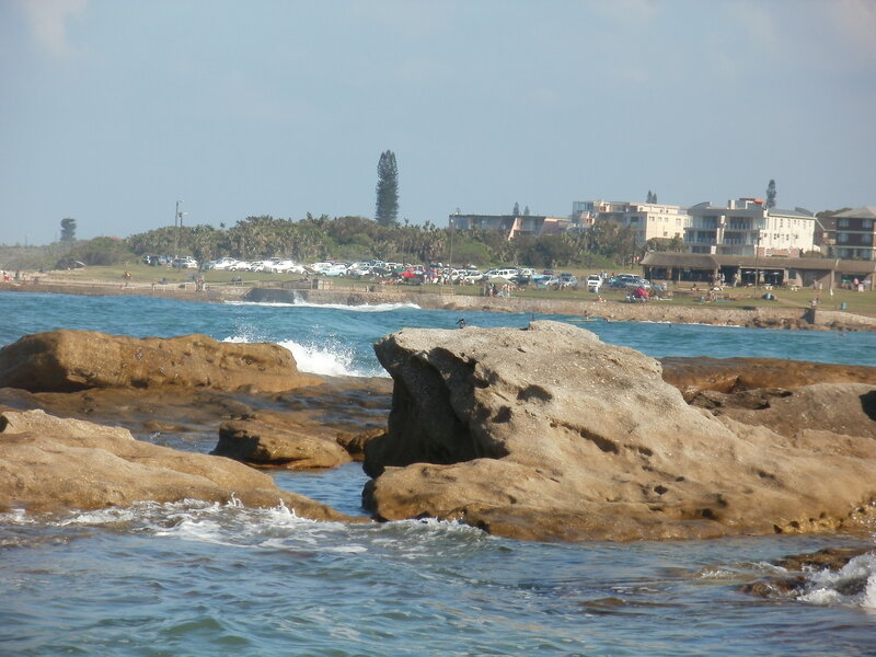 Rocky Shoreline with Buildings