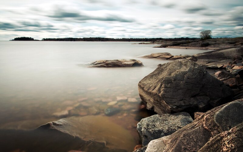 Rocky shoreline with calm water