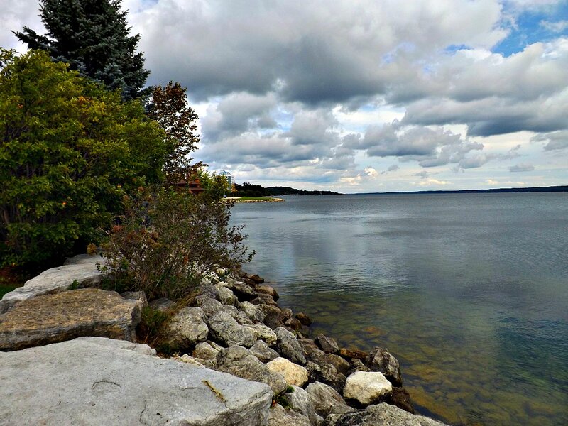 Rocky Shoreline with Lake — Blue, Serene