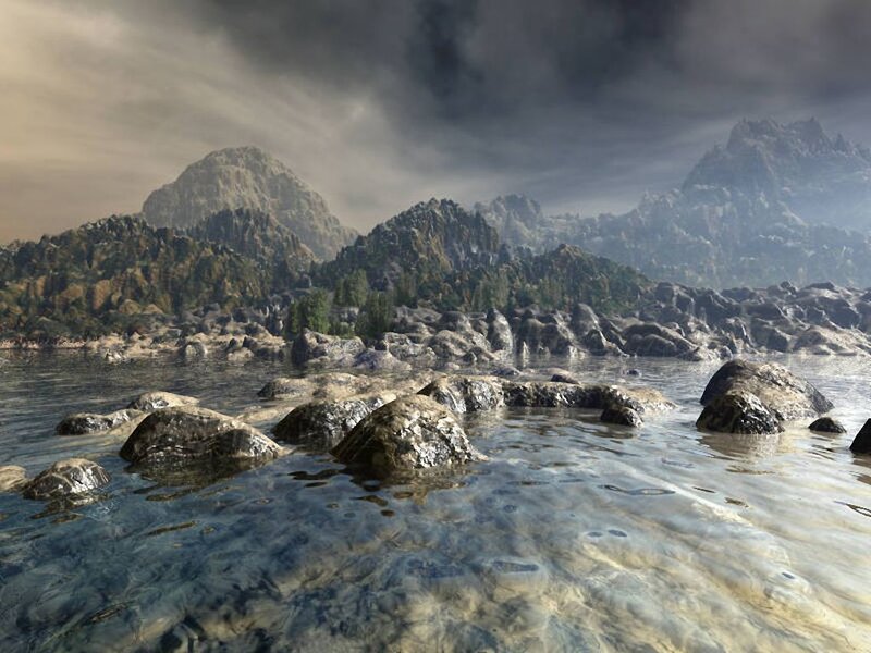 Rocky Shoreline with Mountains — Gray