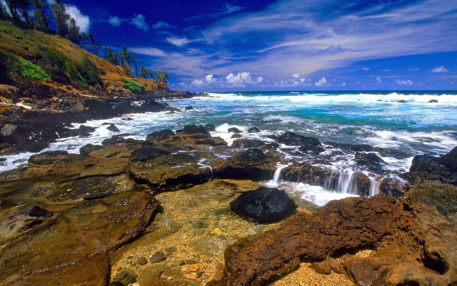 Rocky shoreline with ocean waves