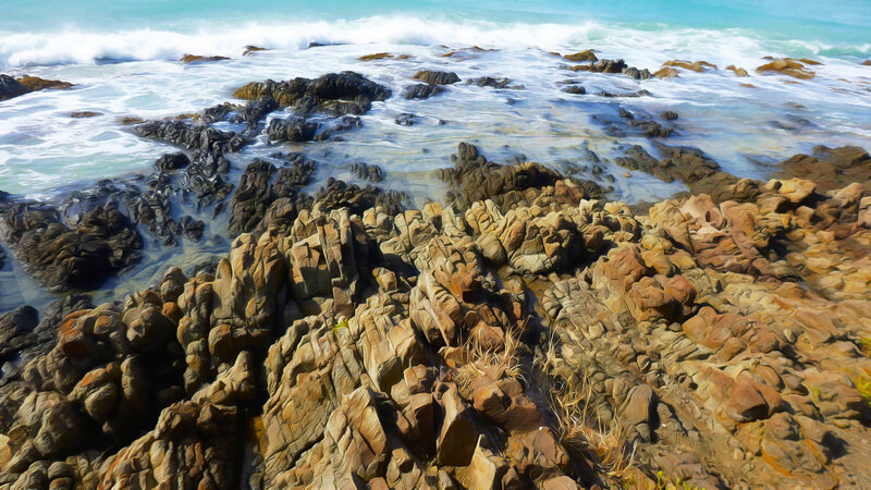 Rocky Shoreline with Waves — Blue
