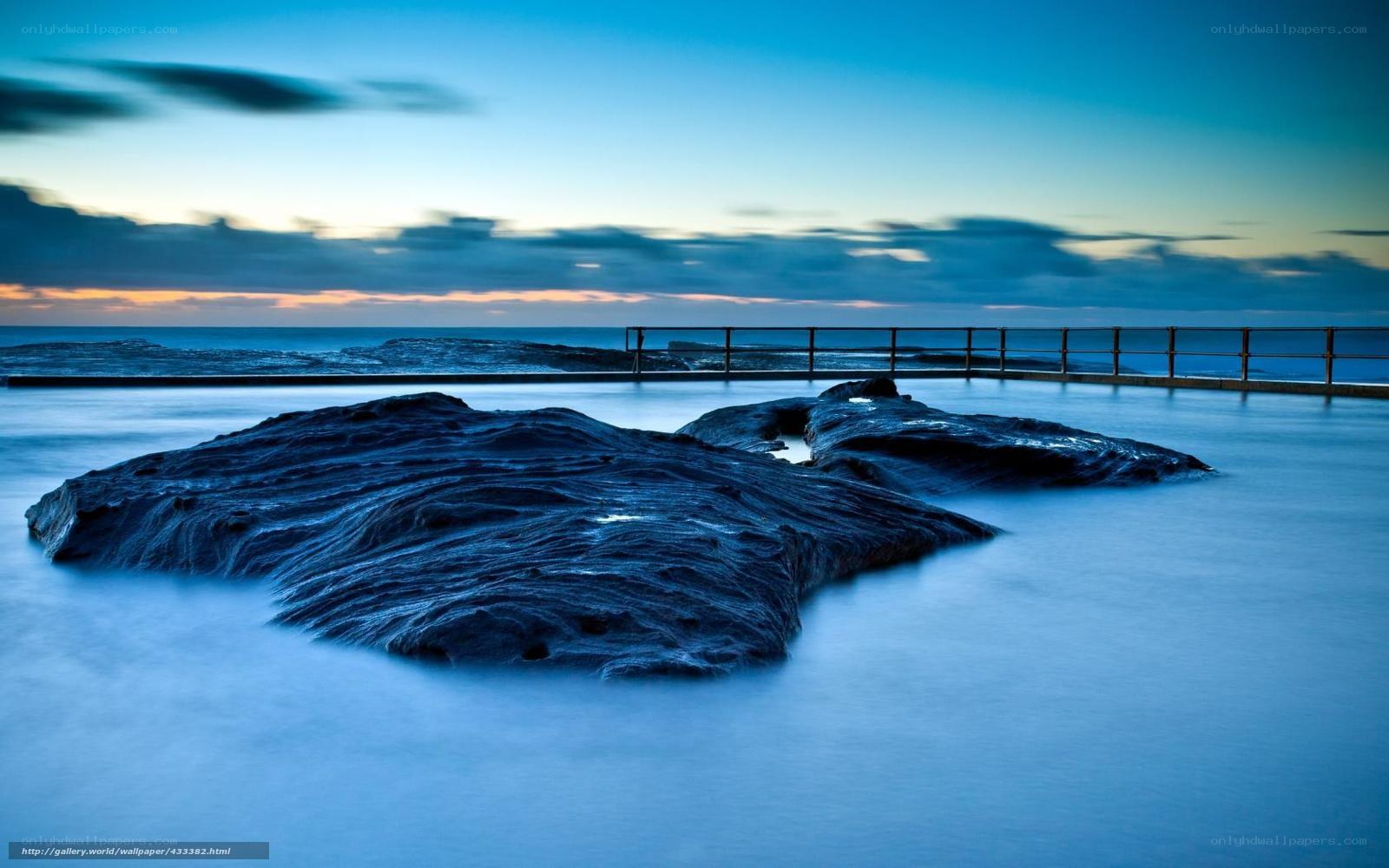 Rocky tide pool at dusk