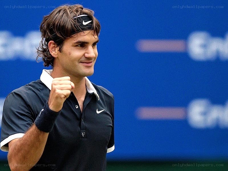 Roger Federer celebrates victory