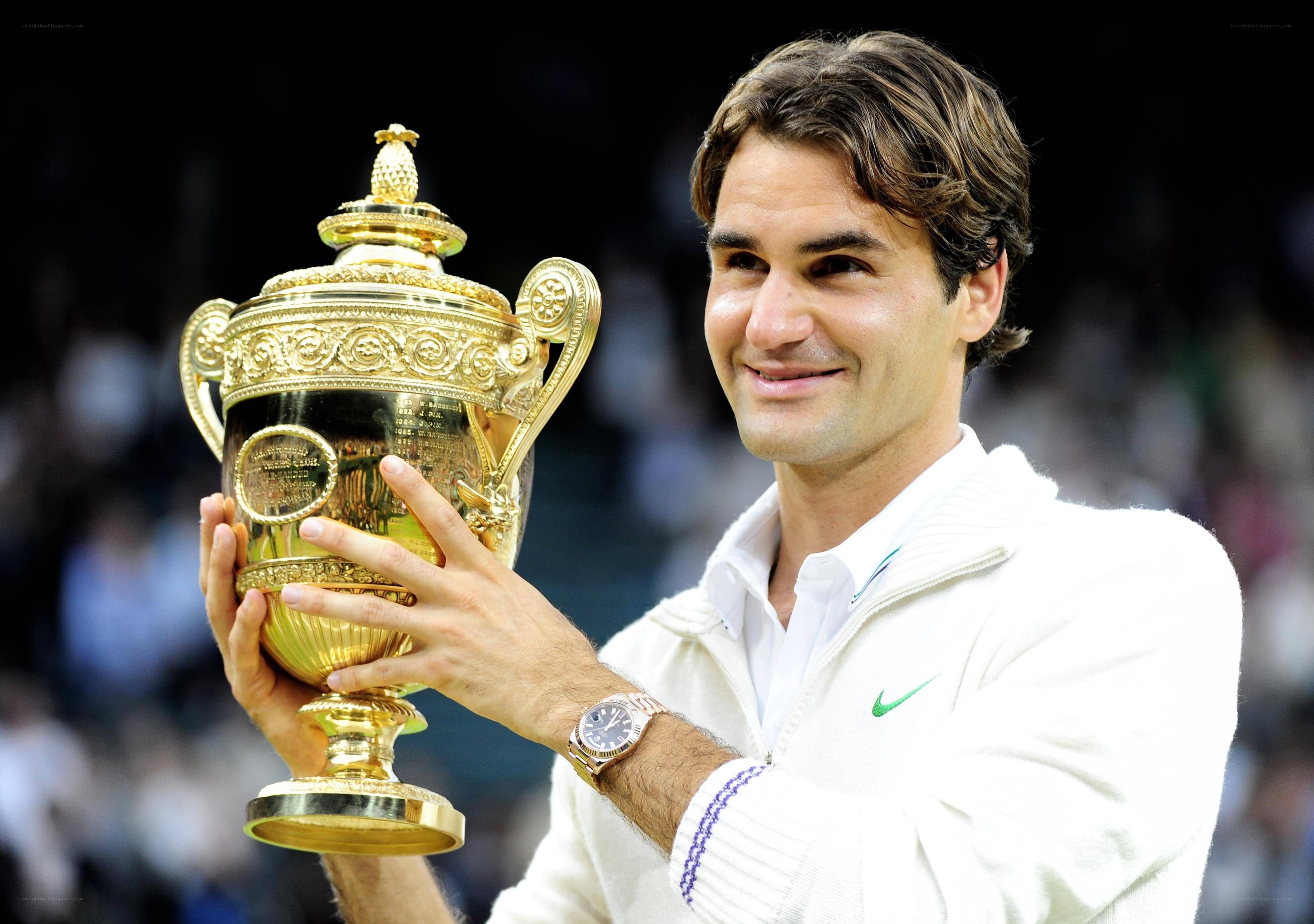 Roger Federer holding trophy