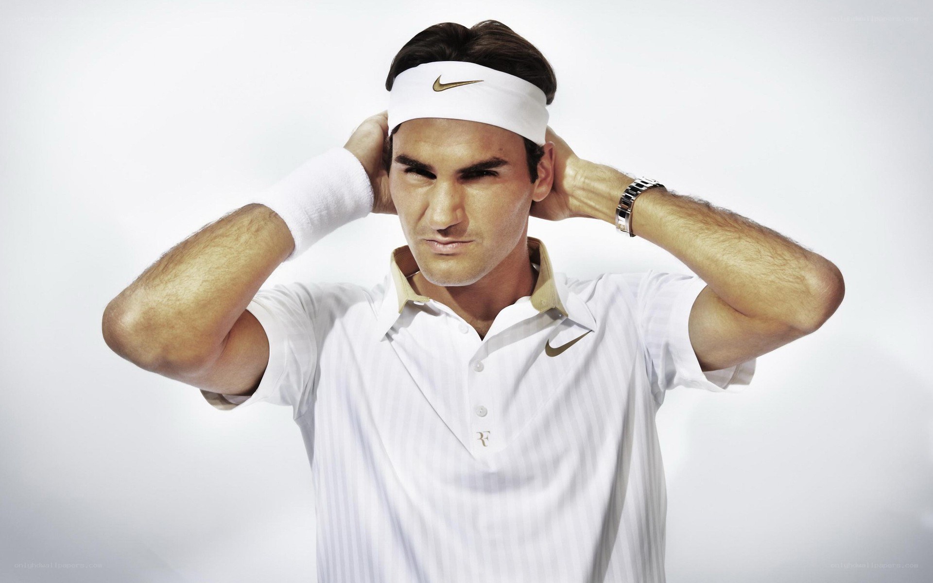Roger Federer in white attire