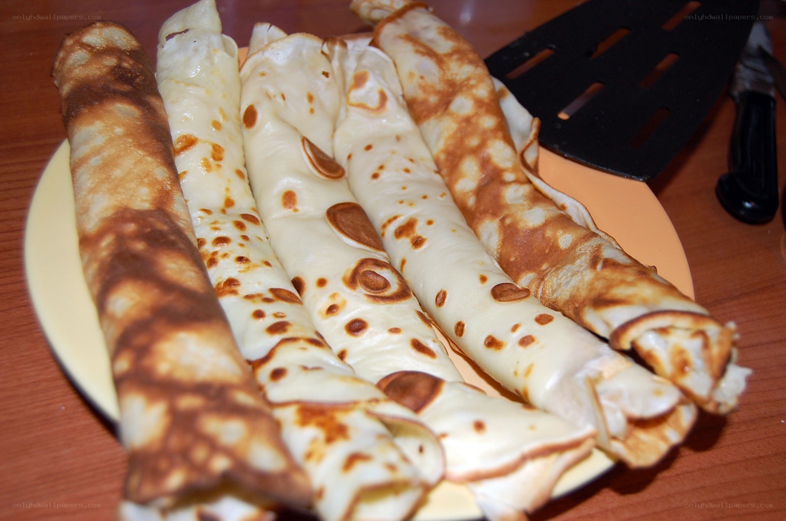 rolled crepes on a plate