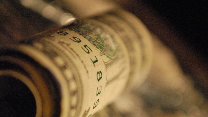 rolled dollar bills close-up