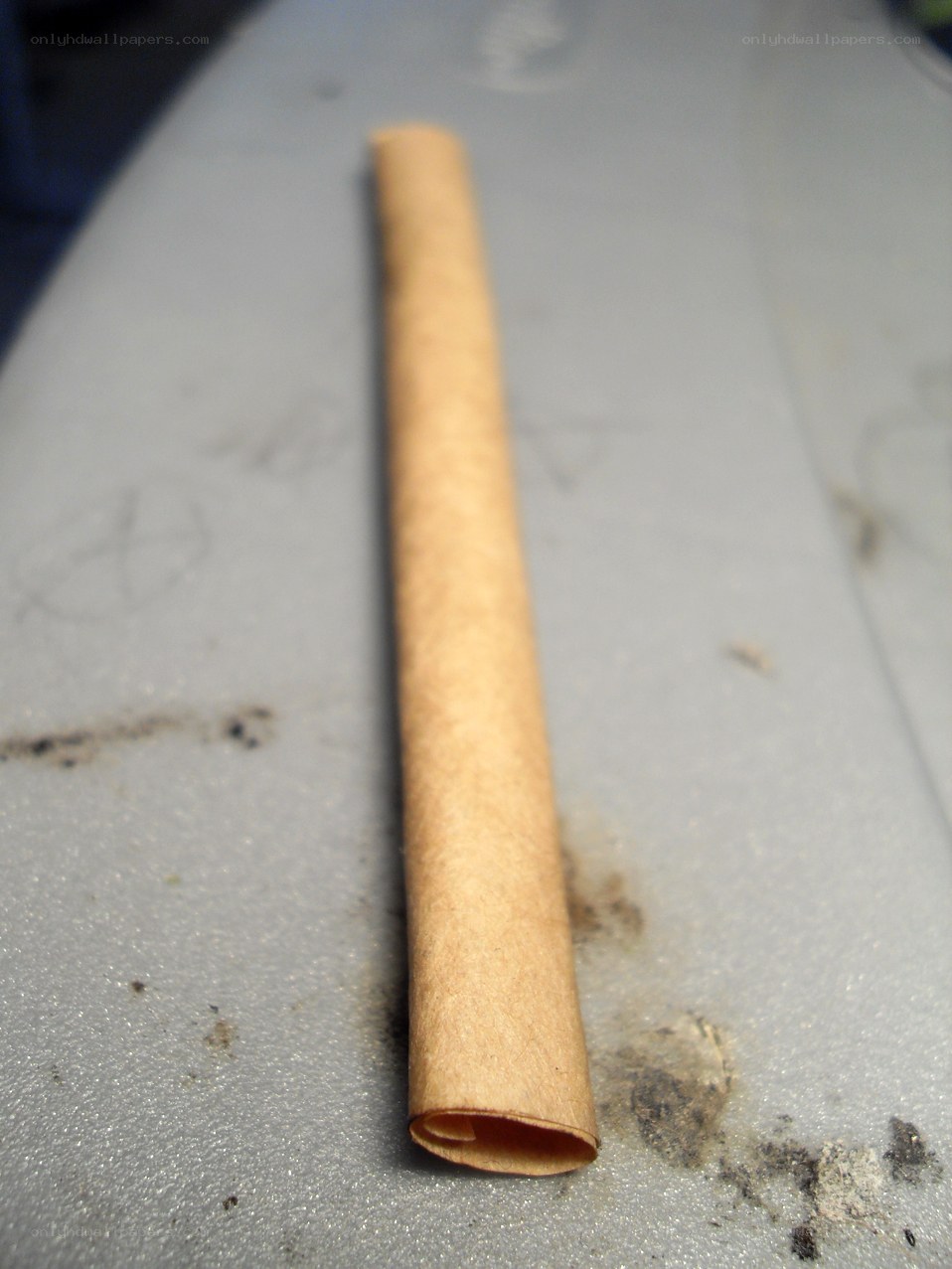 rolled paper tube on surface