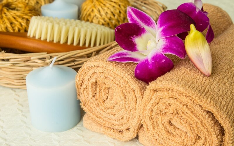 Rolled Towels with Orchid — Brown