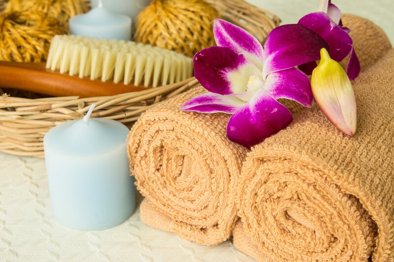 Rolled Towels with Orchid