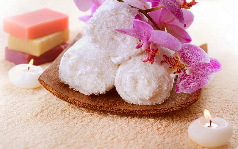 Rolled Towels with Orchid — White