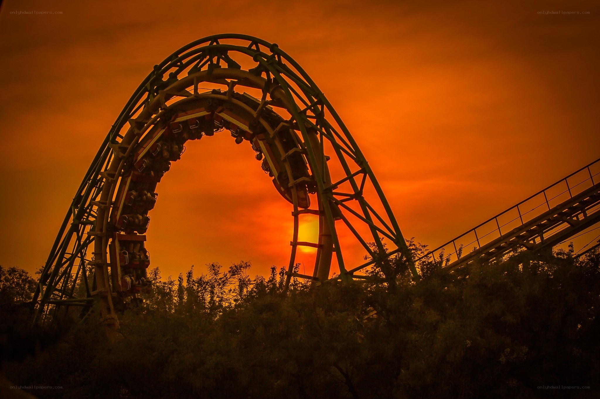 Roller coaster at sunset