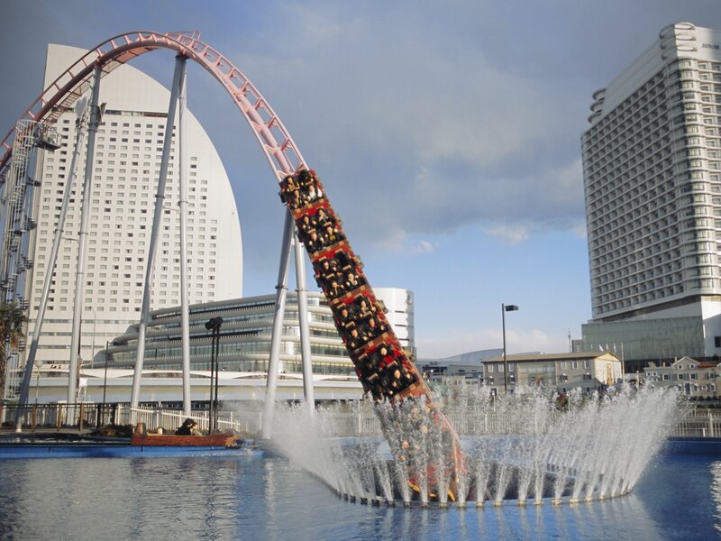 Roller coaster plunging into water