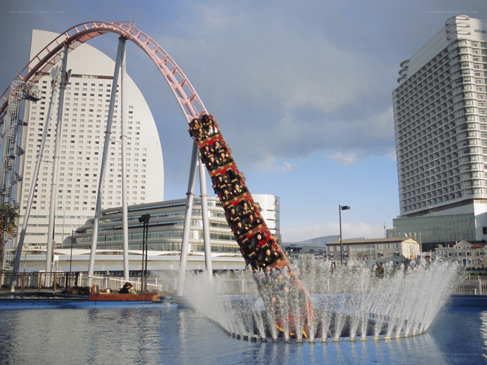 Roller coaster plunging into water